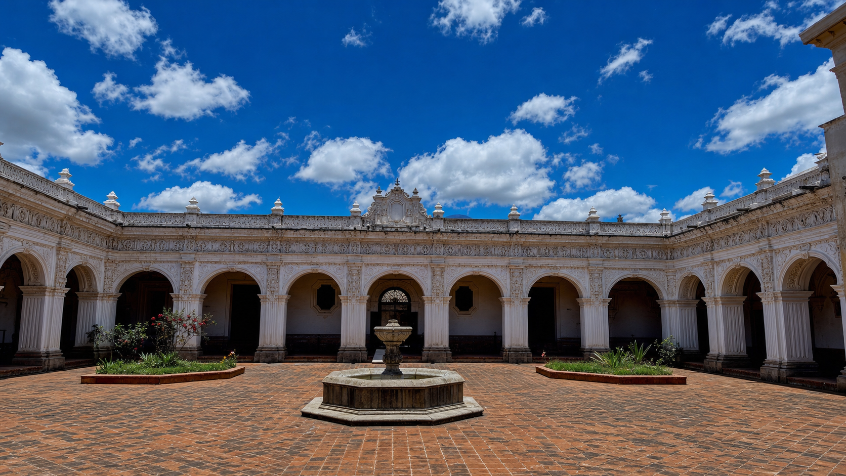 Museo de Arte Colonial baroque courtyard with fountain and ornate arcades