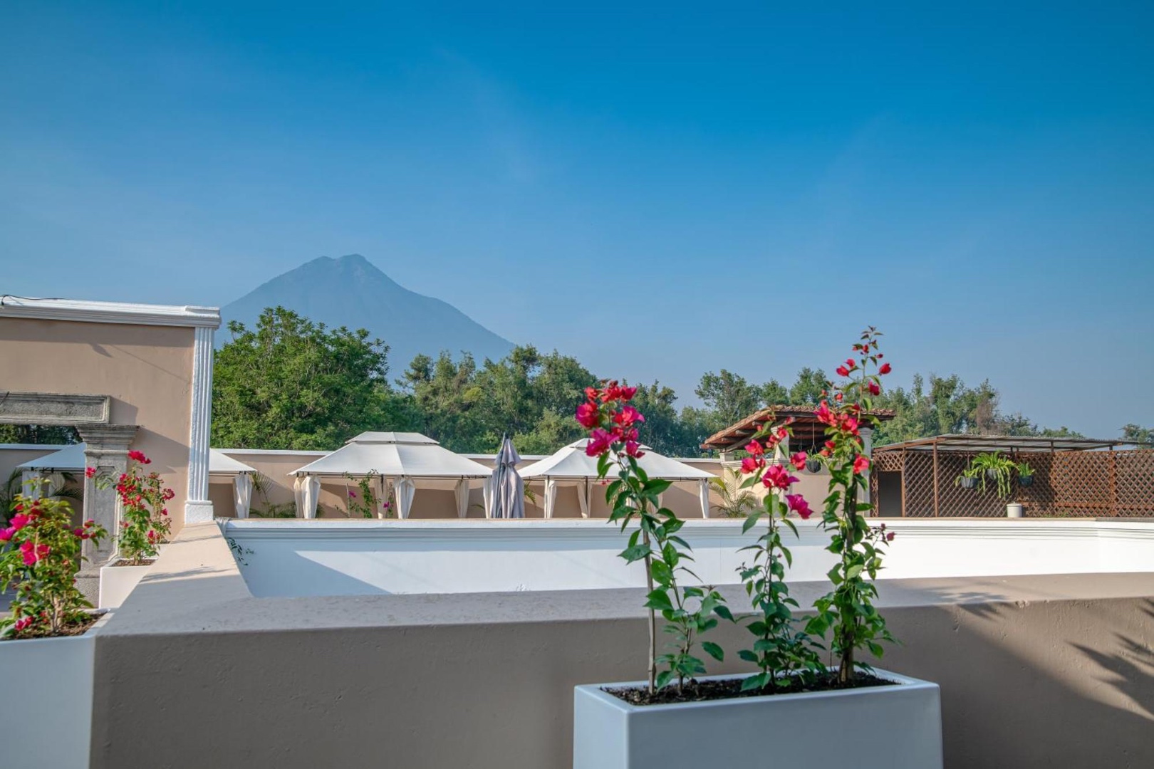 Hotel Casa Carmina rooftop terrace with volcano views